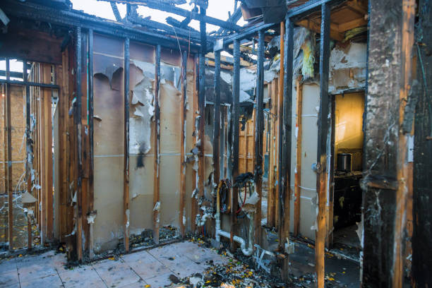 Professional Emergency Fire Damage Restoration technician working in Robbinsville, NJ